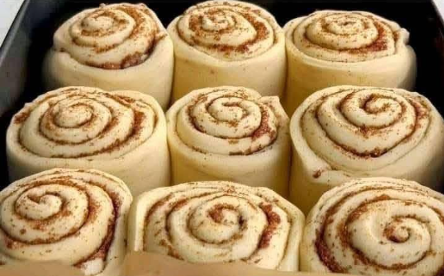 Soft and Fluffy Cinnamon-Walnut Rolls with Cream Cheese Frosting